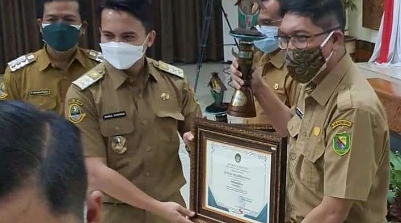 Disperkimtan Raih Penghargaan ke II saat Rakor Penuntasan Program Kerja 99 Hari Bedas