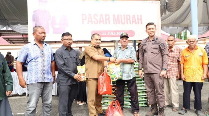 Pj Bupati Aceh Besar Buka Pasar Murah, Perkuat Solidaritas Sosial di Hari Bhakti Adhyaksa